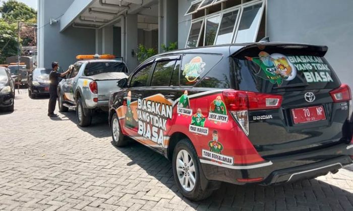 Sosialisasikan Protokol Kesehatan, Kepala BPB Linmas Branding Mobil Dinasnya Sosialisasikan Protokol Kesehatan, Kepala BPB Linmas Branding Mobil Dinasnya
