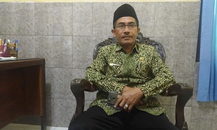 Batal Berangkat Tahun ini, 63 CJH di Sampang Tarik Uang Pendaftaran Batal Berangkat Tahun ini, 63 CJH di Sampang Tarik Uang Pendaftaran