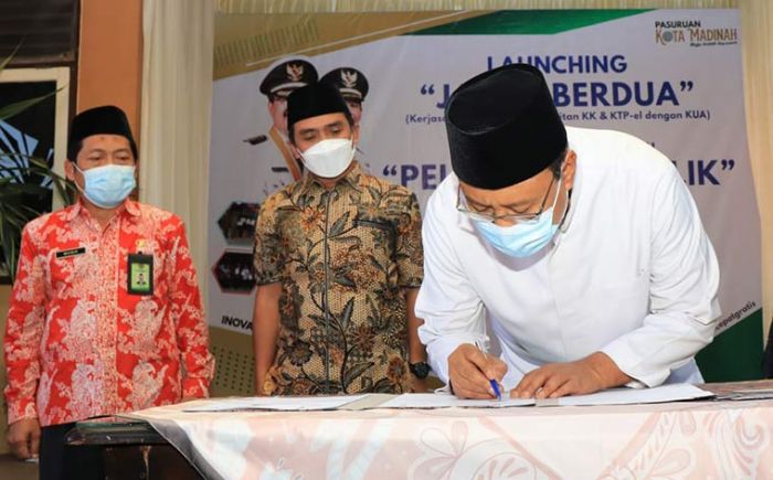 Jalan Berdua Dilaunching, Pengantin Baru di Kota Pasuruan Bisa Urus KTP dan KK Elektronik dari Rumah Jalan Berdua Dilaunching, Pengantin Baru di Kota Pasuruan Bisa Urus KTP dan KK Elektronik dari Rumah