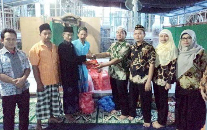 Berbagi Berkah Ramadan, Megasurya Buka Puasa Bersama Warga Sekitar