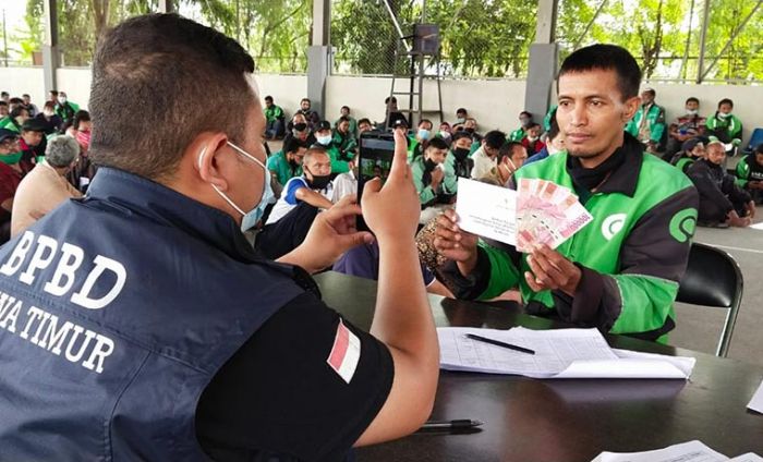 Terdampak Pandemi, 4.100 Driver Online Jawa Timur Dapat Bantuan dari Pemprov Terdampak Pandemi, 4.100 Driver Online Jawa Timur Dapat Bantuan dari Pemprov