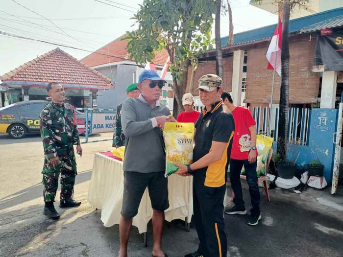 Polsek Buduran Bersama Koramil Distribusikan Beras SPHP Melalui Program GPM