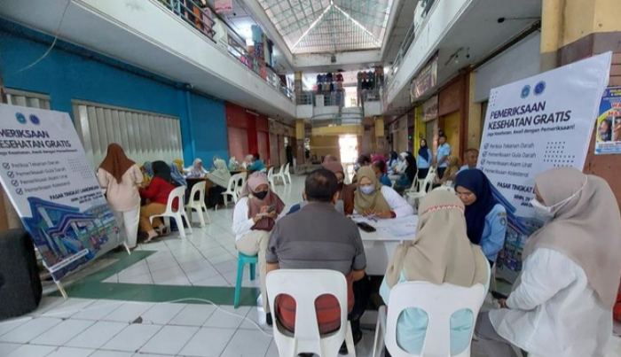 Ratusan Pedagang dan Pengunjung Antusias Ikuti CKG di Pasar Lamongan