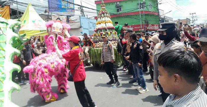 Semarak Kirab Budaya Sedekah Bumi di Krian, Polisi Lakukan Pengamanan Ketat Semarak Kirab Budaya Sedekah Bumi di Krian, Polisi Lakukan Pengamanan Ketat