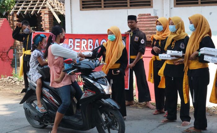 Prihatin Dampak Pandemi, PSH Winongo Cabang Mojokerto Bagi Ratusan Nasi Kotak Prihatin Dampak Pandemi, PSH Winongo Cabang Mojokerto Bagi Ratusan Nasi Kotak