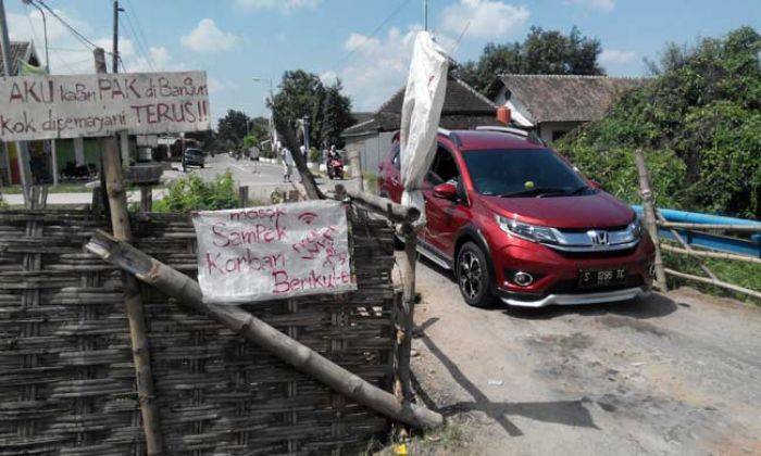 Jembatan di Dusun Jolotundo Setahun Dibiarkan Rusak, Warga Tagih Janji Perbaikan Jembatan di Dusun Jolotundo Setahun Dibiarkan Rusak, Warga Tagih Janji Perbaikan