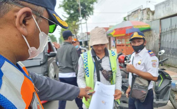 Tertibkan Juru Parkir, Dishub Bangkalan Ingatkan soal Pidana Tertibkan Juru Parkir, Dishub Bangkalan Ingatkan soal Pidana