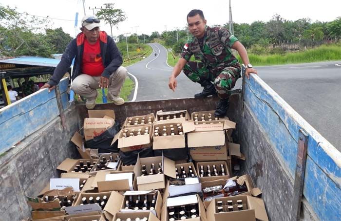 Satgasmar Ambalat Berhasil Amankan Ratusan Botol Miras Ilegal Satgasmar Ambalat Berhasil Amankan Ratusan Botol Miras Ilegal