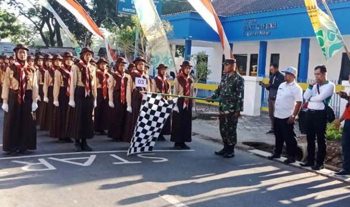 Danramil 0803/08 Mejayan Bersama Forpimka Lepas Peserta Lomba Gerak Jalan HUT RI