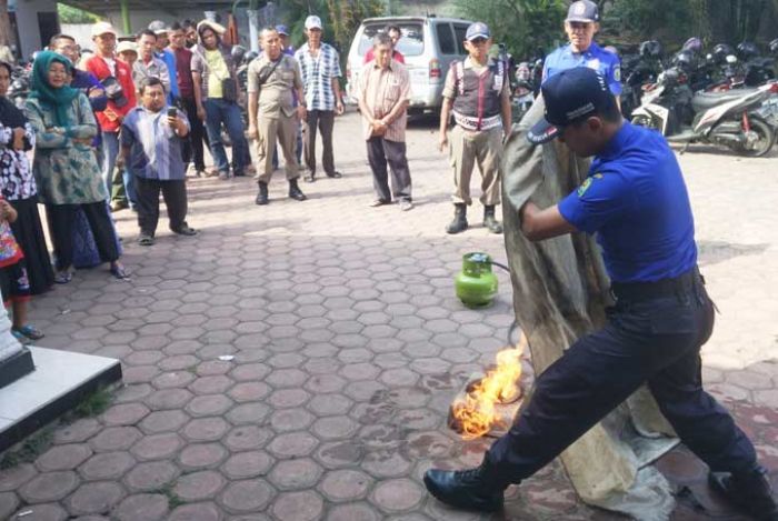 Jangan Lempar Kain Basah ke Titik Api Jangan Lempar Kain Basah ke Titik Api