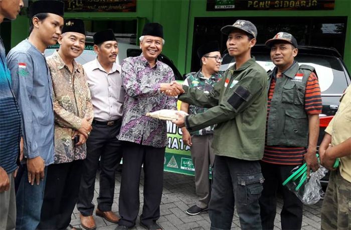 Bantu Korban Tsunami Selat Sunda, NU Sidoarjo Kirim Bantuan Rp 100 Juta Bantu Korban Tsunami Selat Sunda, NU Sidoarjo Kirim Bantuan Rp 100 Juta