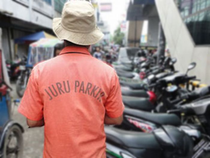 Pemkab Tuban Sediakan Rompi Khusus untuk Jukir Resmi Pemkab Tuban Sediakan Rompi Khusus untuk Jukir Resmi