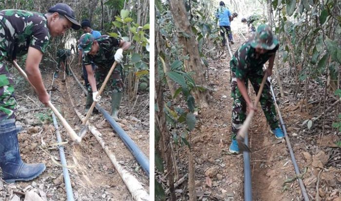 Satgas TMMD Kodim Sampang Pasang Pompa dan Pipa Saluran Air