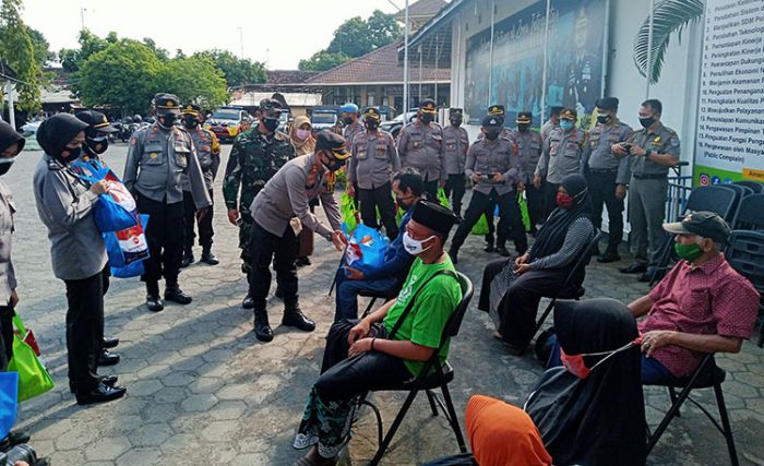 PPKM Darurat, Polres Probolinggo Kota Salurkan 50 Ton Beras untuk Warga Terdampak