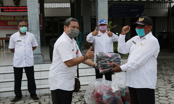 Pertahankan Zero Corona, OPD di Ngawi Kompak Bagikan Masker ke Seluruh Desa Pertahankan Zero Corona, OPD di Ngawi Kompak Bagikan Masker ke Seluruh Desa