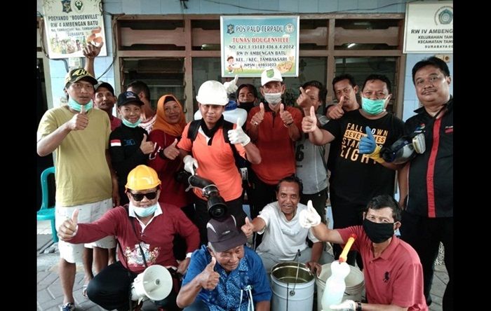 GP NasDem dan Karang Taruna Surabaya Blusukan Kampung Semprot Disinfektan