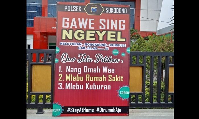 Imbau Warga agar Tetap di Rumah, Polresta Sidoarjo Sebar Baliho Gawe Sing Ngeyel