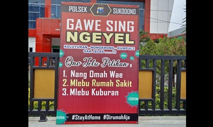 ​Imbau Warga agar Tetap di Rumah, Polresta Sidoarjo Sebar Baliho Gawe Sing Ngeyel