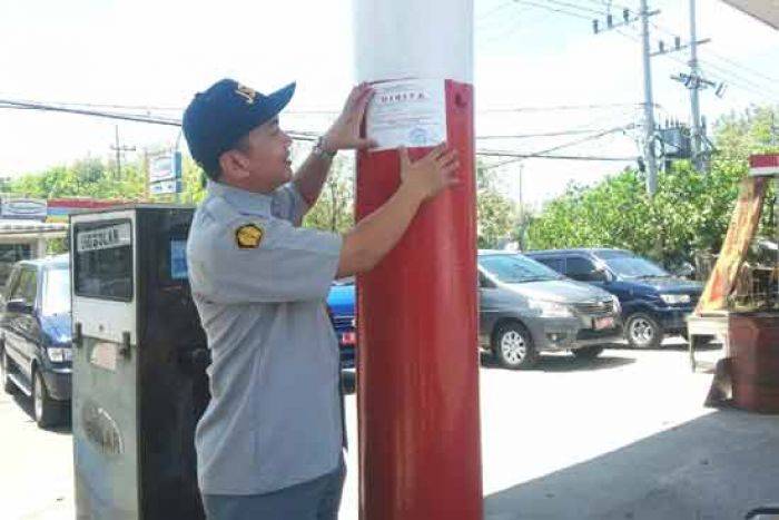 Tunggak Pajak, SPBU Manukan Tama Disegel Tunggak Pajak, SPBU Manukan Tama Disegel