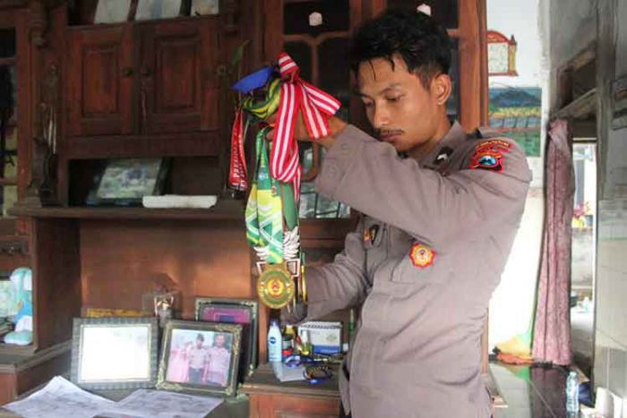 Berdinas di Polres Kediri Kota, Bripda Andrian Setiyoso Atlet Wushu Berprestasi