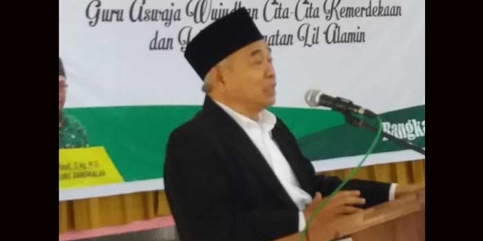 Dr KH Asep Saifuddin Chalim, MA, saat menyampaikan pidato pada Pelantikan dan Raker Pengurus Cabang (PC) Pergunu Bangkalan Madura, Rabu (28/3/2018). foto: MA/bangsaonline.com