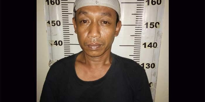 Tersangka saat diamankan.