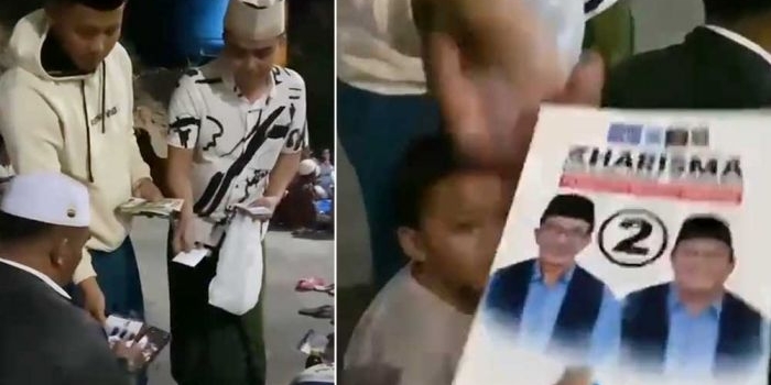 Tangkapan layar video yang menunjukkan adanya bagi-bagi stiker dan amplop diduga berisi uang.