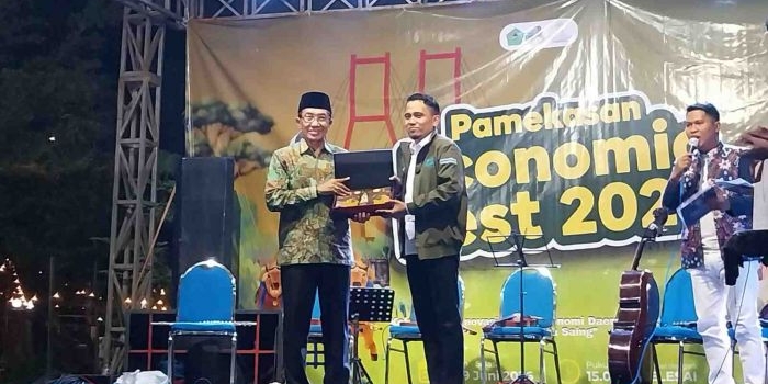Ketua Umum BPC HIPMI Pamekasan, Ach. Kusyairi dan Bupati Pamekasan Kholilurrohman dalam acara pembukaan  Economic Fest 2026, Senin (1/6/2026) malam. Foto: Dim/bangsaonline