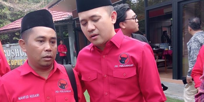 Mahfud Husairi (kiri)