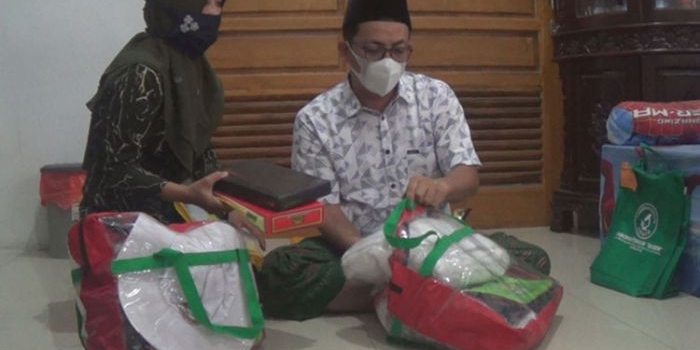 Minarto dan Nurul Aini, CJH asal Jombang. (foto: AAN AMRULLOH/ BANGSAONLINE)