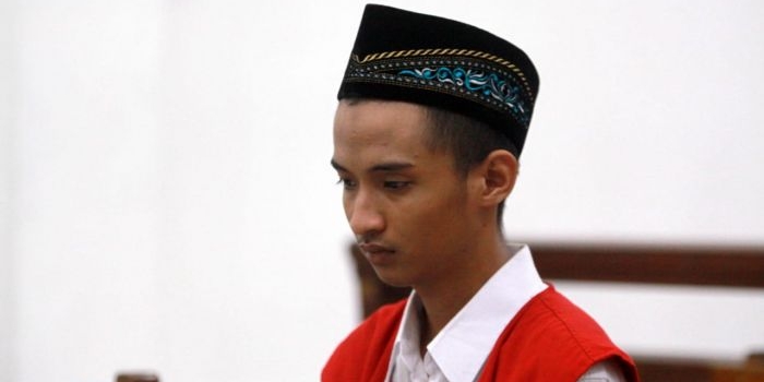 Terdakwa saat menjalani sidang.