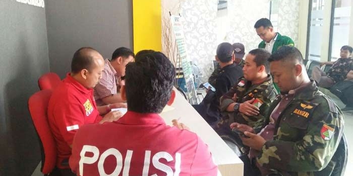 PC GP Ansor Kabupaten Sidoarjo saat melaporkan terduga pelaku ke SPKT Polresta Sidoarjo, Kamis (25/4).