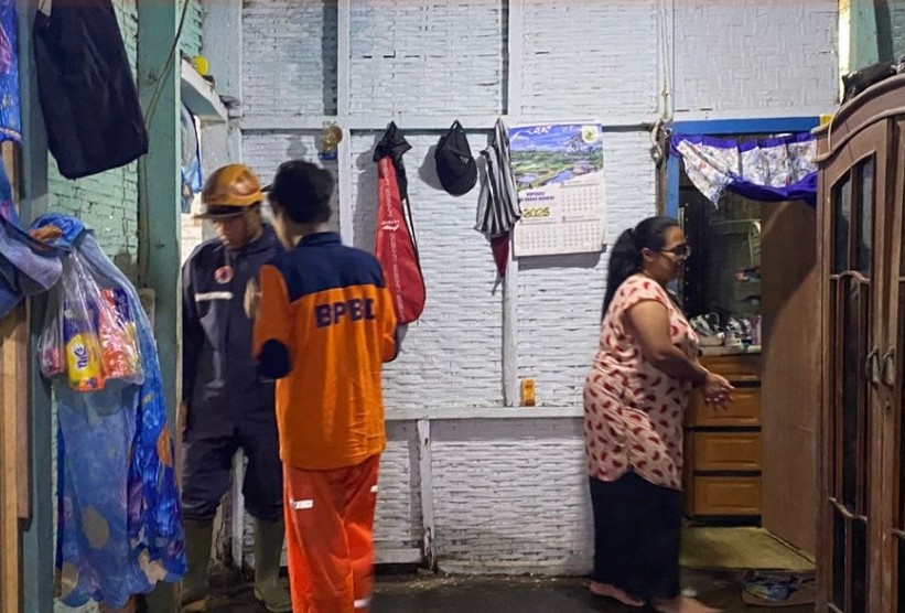 Rumah Bapak Ngateno, warga jalan Welirang Gg. IV E RT 06, RW IX, Dusun Junggo, Desa Tulungrejo, Kecamatan Bumiaji, Kota Batu yang rumahnya diterjang banjir