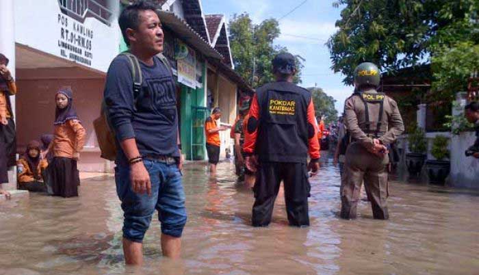 Banjir di Kelurahan Meri, Kecamatan Magersari Mojokerto. foto: yudi eko purnomo/ BANGSAONLINE
