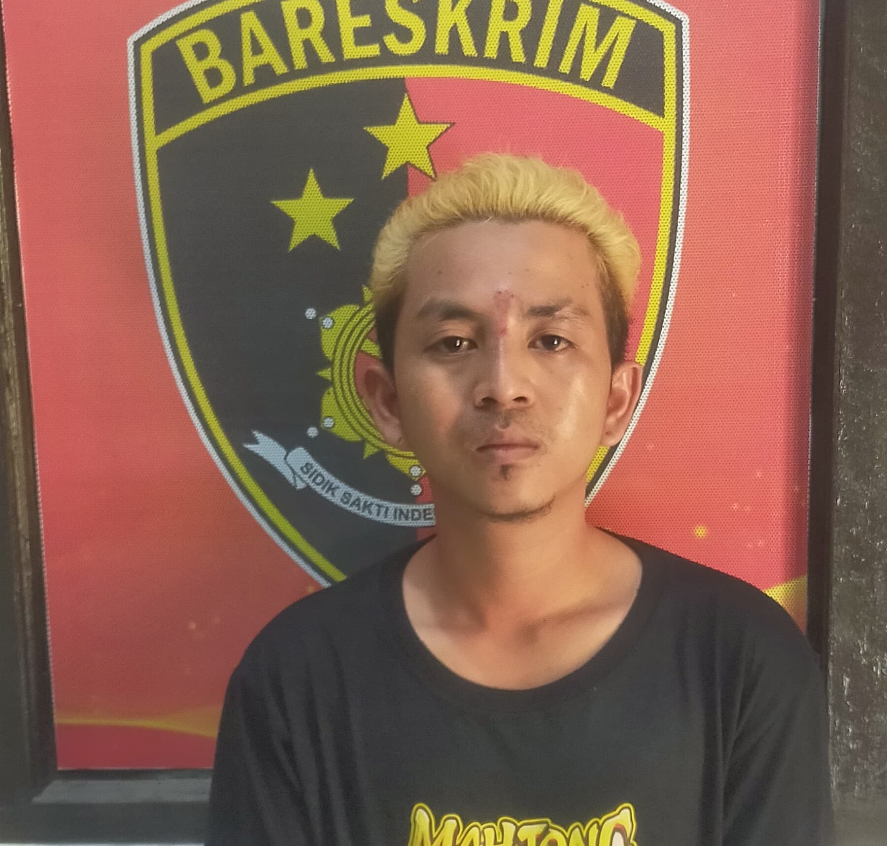 Tampang pelaku saat diamankan di Polsek Pandaan