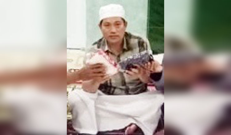 Adnan, Kepala Desa Talango.