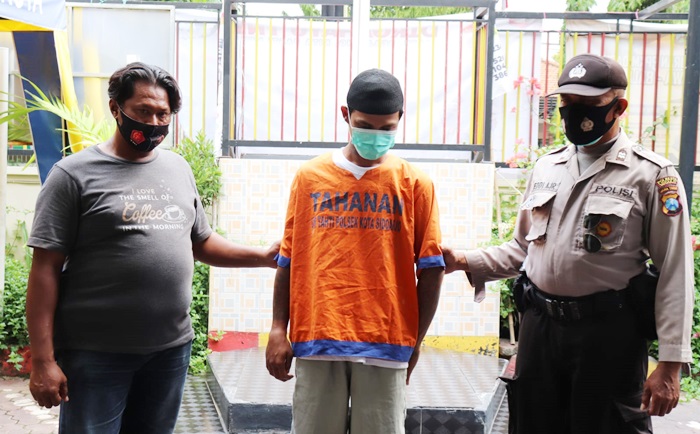 Salah satu pelaku pengeroyokan di Sidoarjo yang berhasil diamankan polisi.